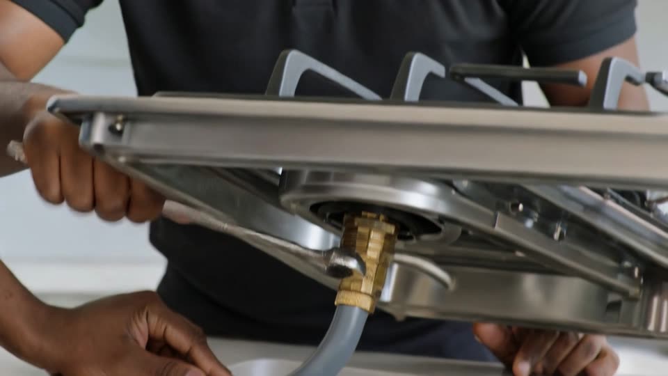 Gas Installers Johannesburg - LPG gas hob connection being made by a registered gas installer
